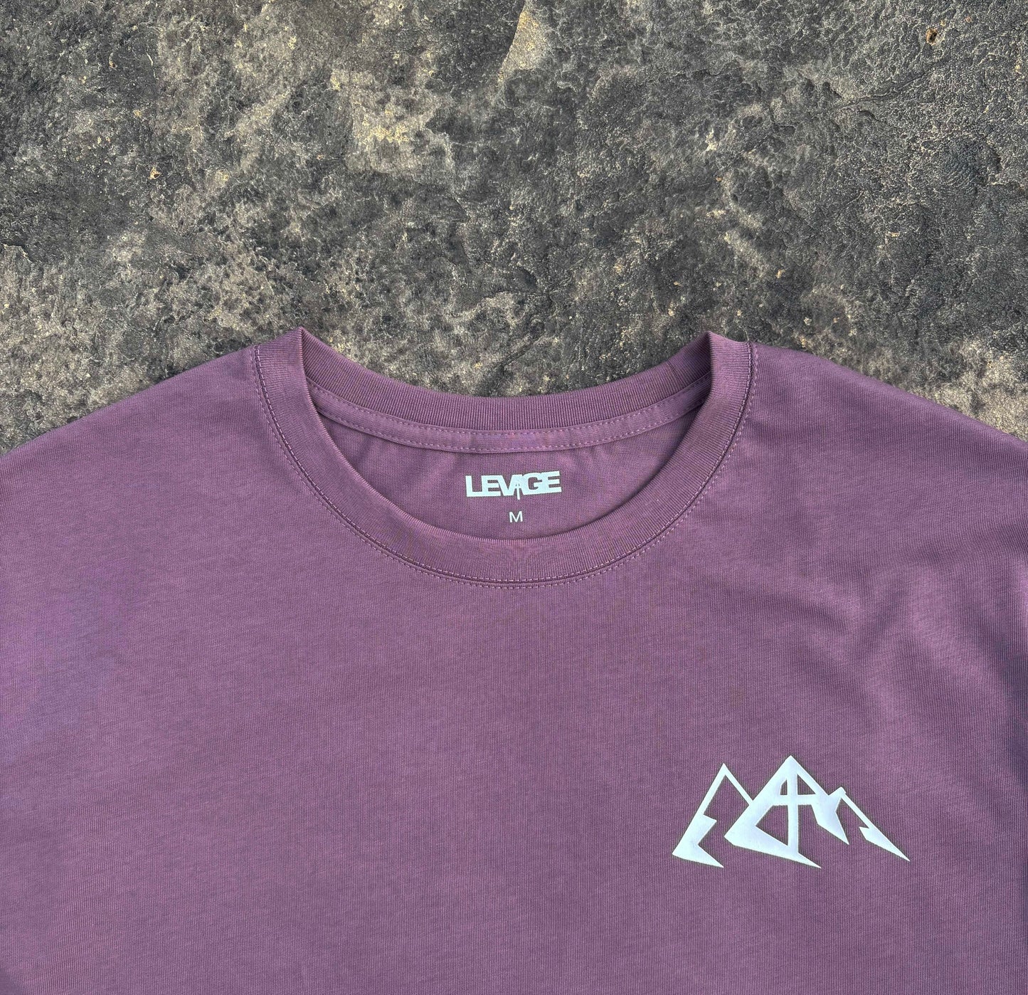 Rise Faith T Shirt showing front and back views, logo on collar, and inspirational quote design for fashion branding.