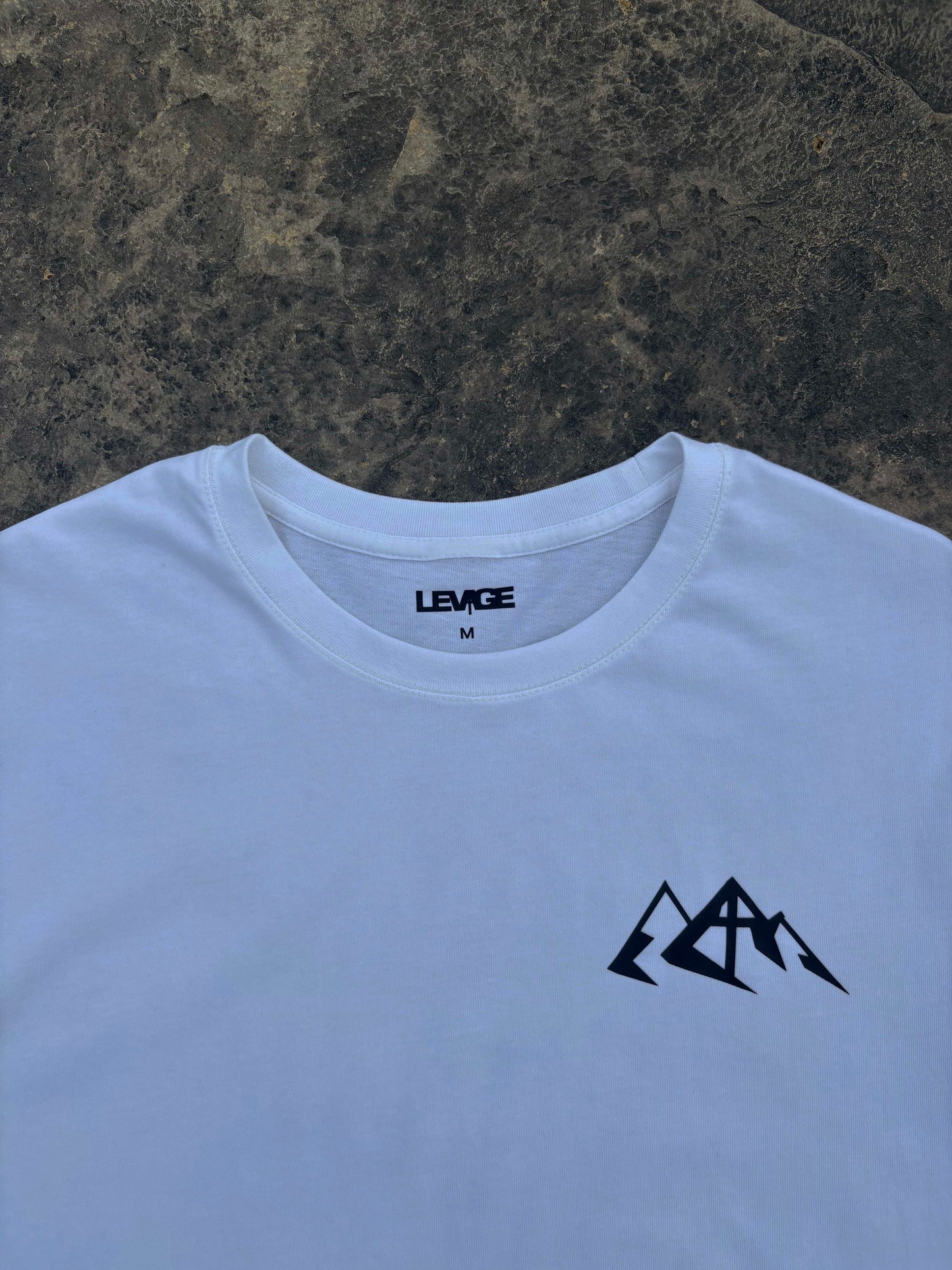 Rise Faith T Shirt showing front and back views, logo on collar, and inspirational quote design for fashion branding.