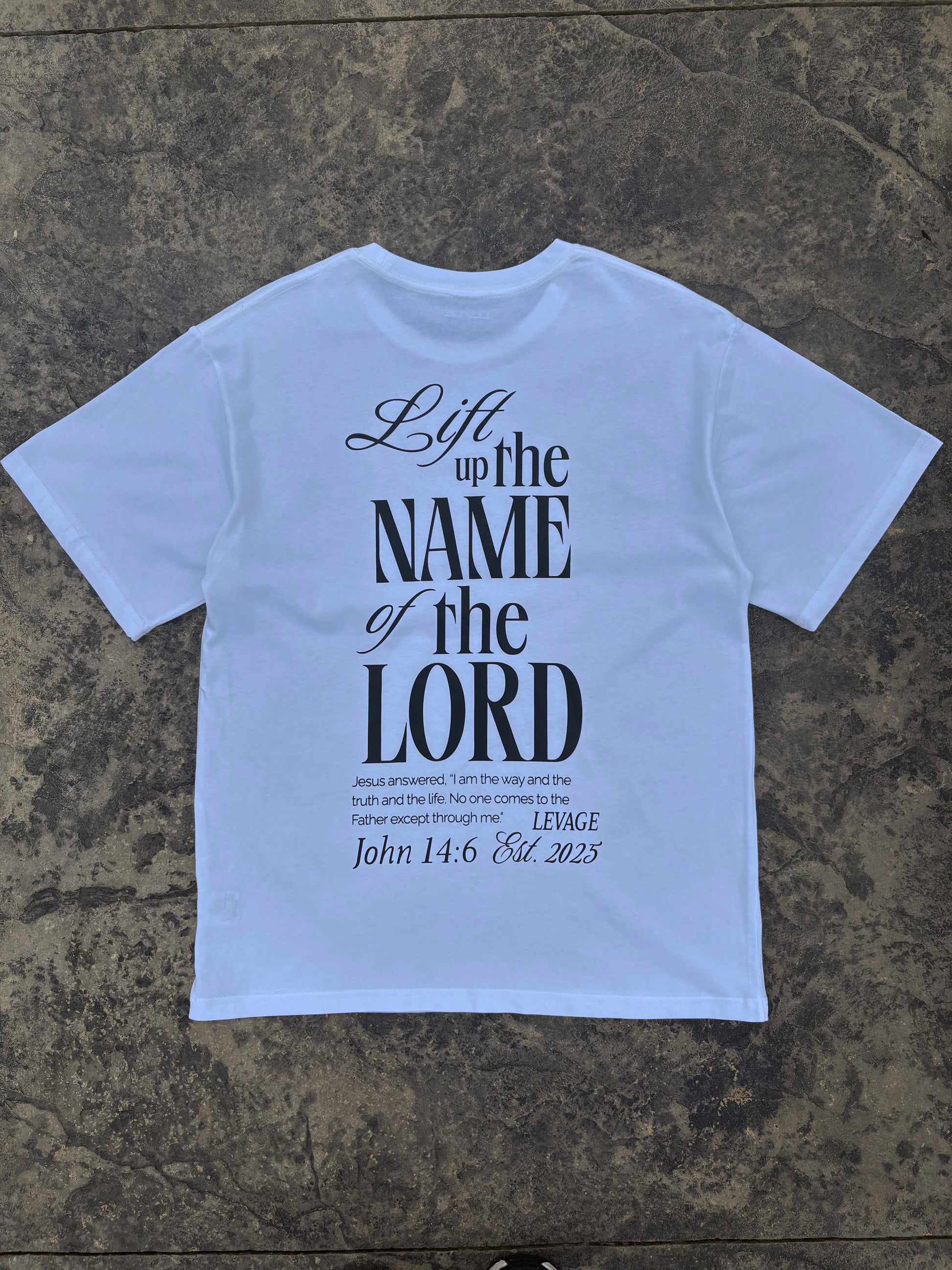 Rise Faith T Shirt showing front and back views, logo on collar, and inspirational quote design for fashion branding.
