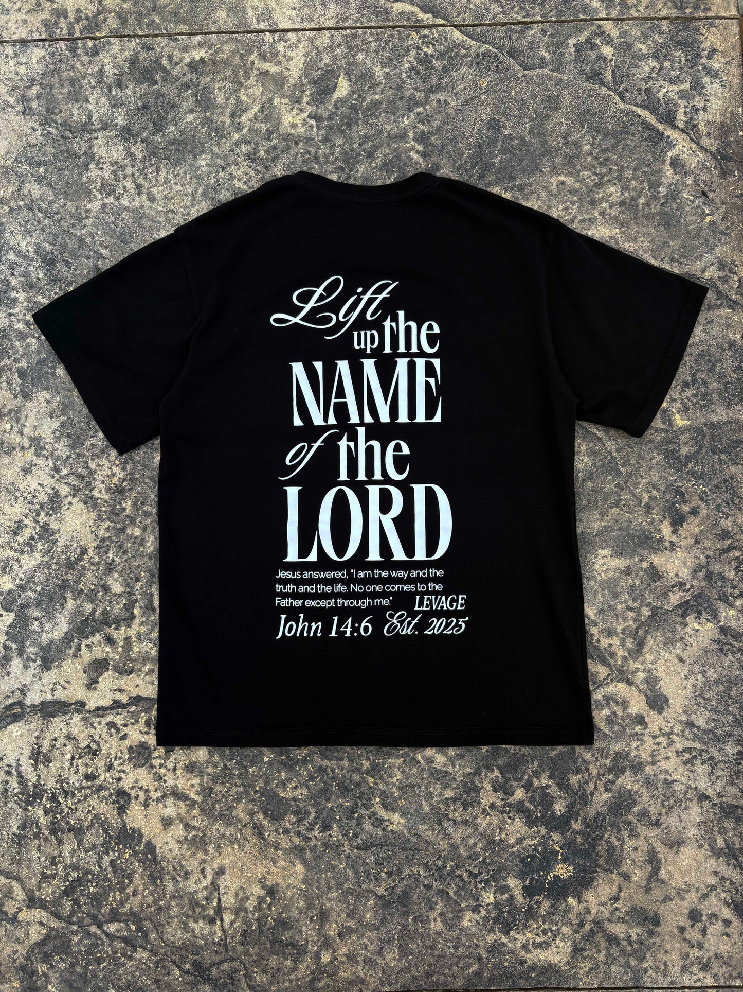 Rise Faith T Shirt showing front and back views, logo on collar, and inspirational quote design for fashion branding.