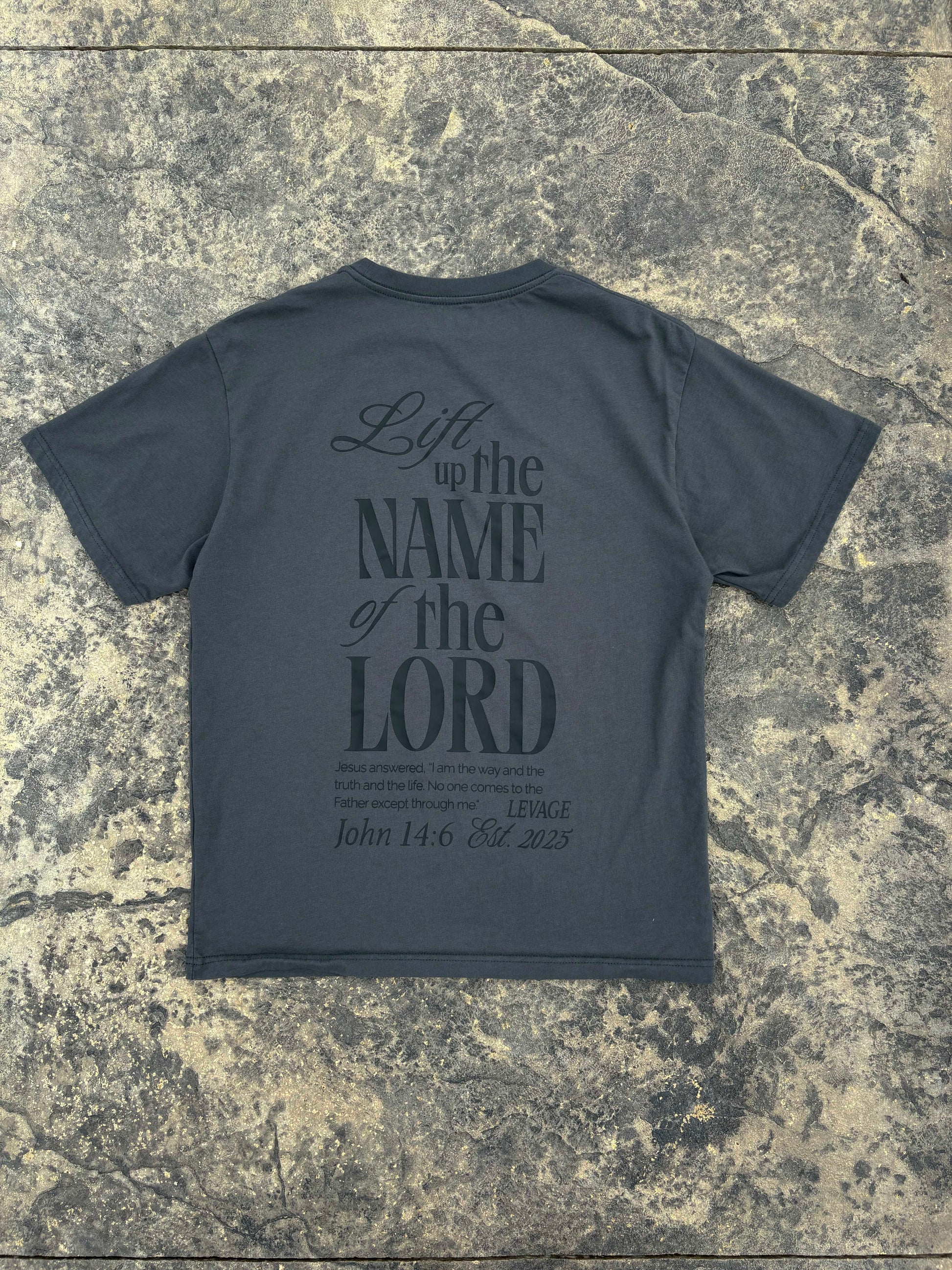 Rise Faith T Shirt showing front and back views, logo on collar, and inspirational quote design for fashion branding.