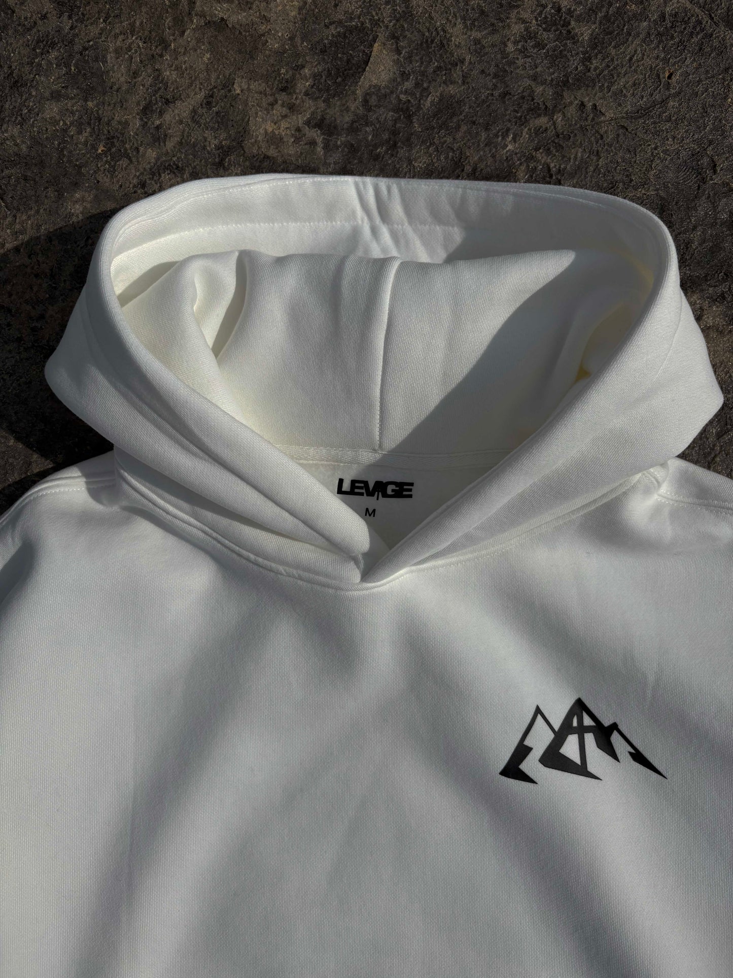 Levage Faith hoodie featuring comfortable front and back design, stylish hood, perfect for cozy, formal wear.